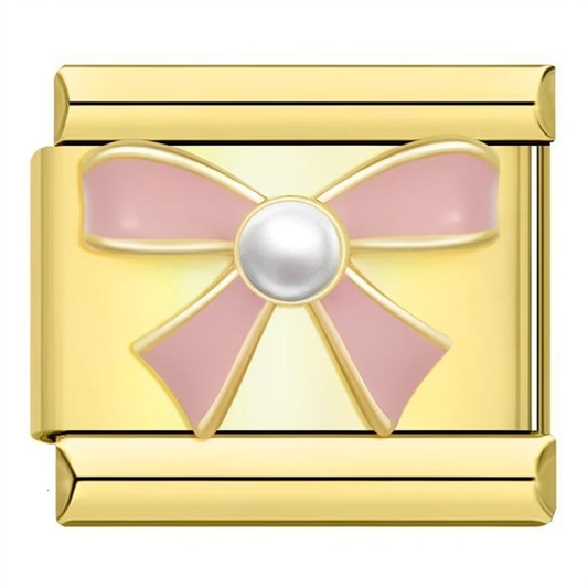 Charm moño rosa dorado
